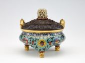 Fig 3: A jade hat knob from the Yuan dynasty was repurposed as lid of a Ming dynasty incense burner - [National Museum of Asian Art(https://asia.si.edu/object/F1961.12a-b/) 