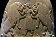 Fig. 1 - Master of Animals on the hilt of the Gebel el Arak knife - Louvre Museum - [E11517](https://collections.louvre.fr/en/ark:/53355/cl010007467)