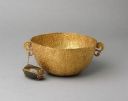 _Fig. 1: Bowl with Bezoar_, Goa (?) India, 17th c. Bezoar, gold. Dm. 14 cm, H. 6,9 cm. Vienna, Kunsthistorisches Museum. Inv. No. Kunstkammer, 1140. The caged bezoar stone attached to the bowl meant that it was easy to remove after allowing it to steep in water or wine.  