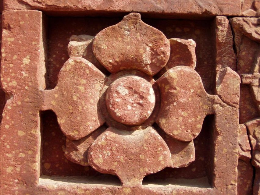 Fig 24: A lotus in red sandstone, a typical symbol in a Hindu temple in India – [wikicommons](https://commons.wikimedia.org/wiki/File:Lotus,_a_typical_Hindu_temple_motive,_in_red_sandstone,_Qutb_complex.jpg)