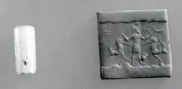 Fig. 2 - Master of Animals on an Assyrian cylinder seal - Metropolitan Museum of Art - [43.102.37](https://www.metmuseum.org/art/collection/search/323997)