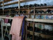 Batik workshop cabinet with Caps, photo by author, 2009