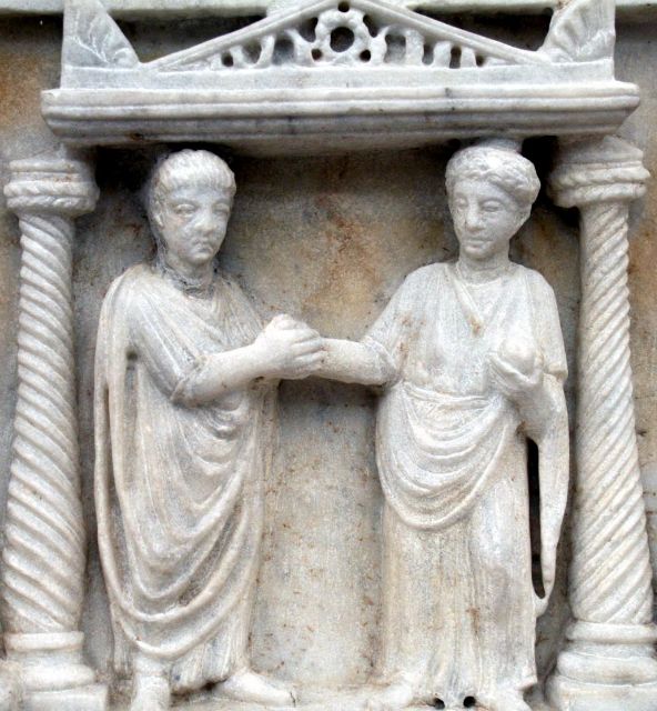 Fig 1: “Dextrarum iunctio. Relief on an urn” - Museo delle Terme di Diocleziano - on [Wikimedia](https://commons.wikimedia.org/wiki/File:Dextrorum_iunctio_edited.JPG) 