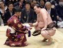 The highest ranking sumō referees (gyōji) wear traditional dress during the tournaments: notice the inrō hanging from his side; pic from the [Japan Times](https://www.japantimes.co.jp/sports/2018/11/20/sumo/sumo-101-gyoji/)