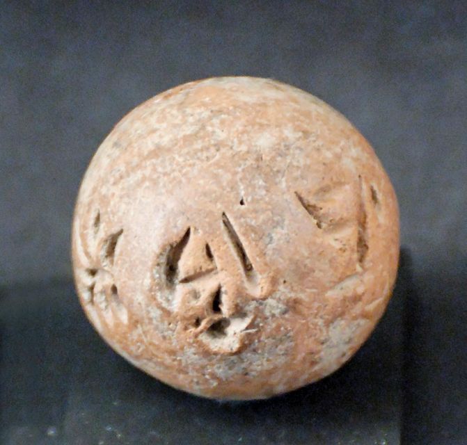 Fig 17: Clay ball with Cypro-Minoan inscriptions currently in the Louvre - [Wikimedia](https://commons.wikimedia.org/wiki/File:Clay_ball_cypro-minoan_Louvre_AM2335.jpg)