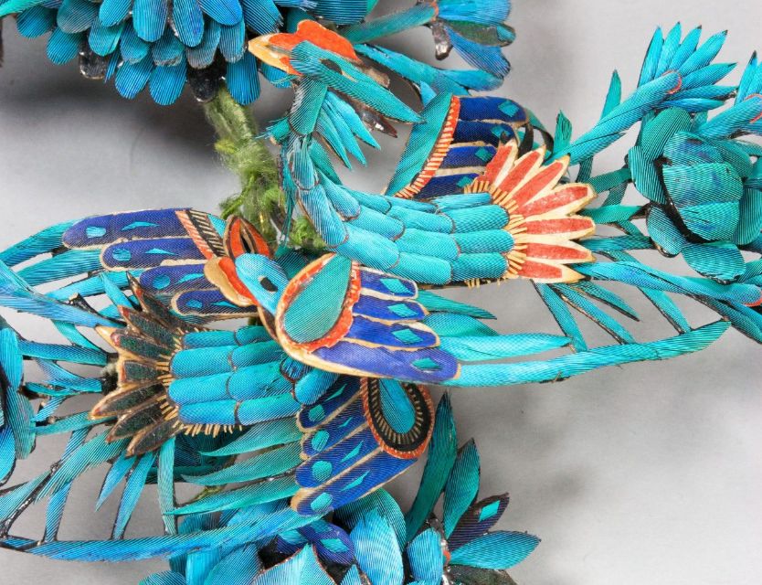 Detail of phoenix from the Kingfisher headdress - Image from blog by Margot Murray - [National Museums Scotland](https://blog.nms.ac.uk/2018/08/02/phoenixes-in-flight-conservation-of-a-chinese-kingfisher-hair-piece/)