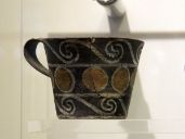 Minoan Pottery Middle Minoan cup with Kamares ware motif, polychrome, found at Phaistos - [Archeological Museum Heraklion](https://commons.wikimedia.org/wiki/File:Cup_with_Kamares_ware_motif,_Phaistos,_1800-1700_BC,_AMH,_144925.jpg)