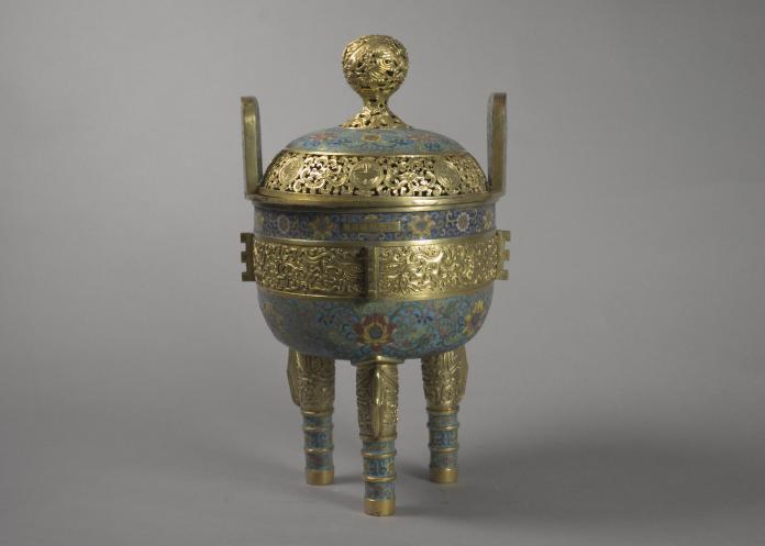 Figure 4: A tripod incense burner, made in China during the Qianlong period (1736-95). From the Metropolitan Museum of Art, [81.1.625a,b](https://www.metmuseum.org/art/collection/search/40621).