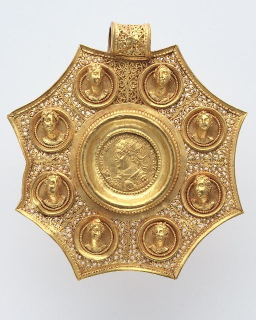 Coin of Constantine the Great (324-326) in a pendant, as part of a necklace - [Wikimedia](File:Byzantium, Late Roman, Eastern Mediterranean, (probably Sirium or Nicomedia - Octagonal Pendant - 1994.98.1 - Cleveland Museum of Art.tif - Wikimedia Commons)