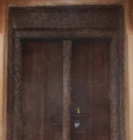  Fig: A traditional ornate aspect of a Swahili front door, old Amu town of Lamu island (listed among UNESCO World Heritage cities - carved by Muhamadi Kijuma in May 1897