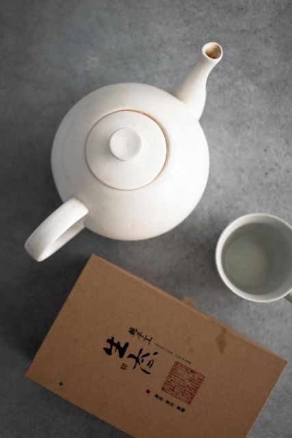 Teapot, teacups, and tea
