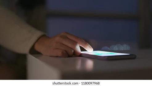 Scrolling on phone at [night](bing.com)