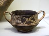 Minoan pottery, Crete, Early Minoan cup with linear style - [Archeological Museum Heraklion](https://commons.wikimedia.org/wiki/File:Minoan_pottery,_Crete,_2600-1900_BC,_AMH,_144578.jpg)