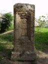 Fig. 4 - Punic stele showing sign of Tanit with crescent, tophet of Carthage - [Wikimedia Commons](https://commons.wikimedia.org/wiki/Category:Tanit_glyphs#/media/File:Karthago_Tophet.JPG)