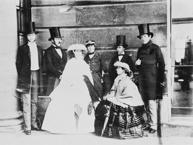 Fig 4: Top hats, worn here by four men of European royalty. [Wikipedia](https://en.wikipedia.org/wiki/Top_hat#/media/File:Group_photograph_of_Queen_Victoria,_Prince_Albert,_Albert_Edward,_Prince_of_Wales,_Count_of_Flanders,_Princess_Alice,_Duke_of_Oporto,_and_King_Leopold_I_of_the_Belgians,_1859.jpg)