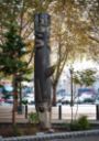 A third totem pole in Seattle picturing a killer whale with a man sitting on it, carved by Duane Pasco. <note>https://seattlearts.emuseum.com/objects/2224/killer-whale-totem</note>.