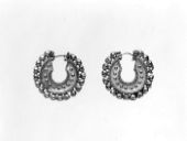 Fig 33: Achaemenid Persion gold crescent-shaped earrings with granulation on the inner and outer edges – Metropolitan Museum of Art – [1995.180a, b](https://www.metmuseum.org/art/collection/search/327506)