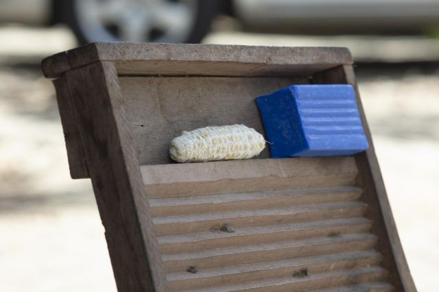 Blue soap and a corn cob