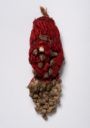 Fig. 1. The object is dipped in red dye, leaving the outer edge of the fabric undyed (for now!) - Photography Cees de Jonge