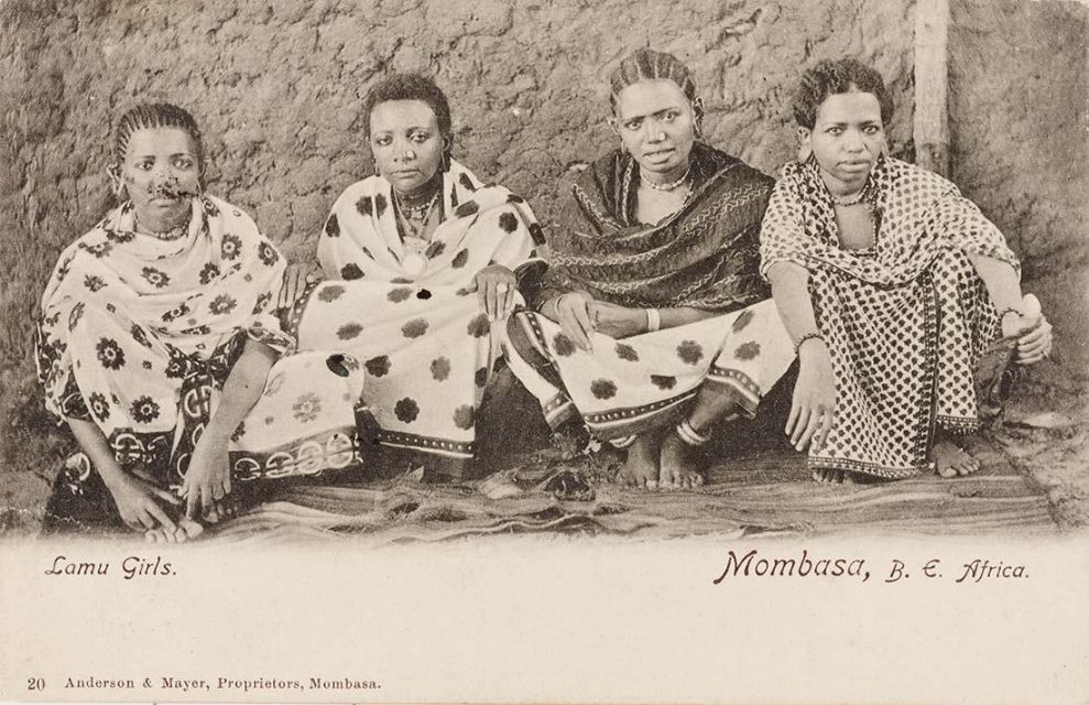 Fig 9: Four girls from Kenya wearing differently patterned kangas - Anderson & Mayer 1920 - [On Afrosartorialism](https://afrosartorialism.wordpress.com/2015/04/25/the-kanga-modernity-conspicuous-consumption-and-cultural-translation-in-colonial-zanzibari-fashion/)