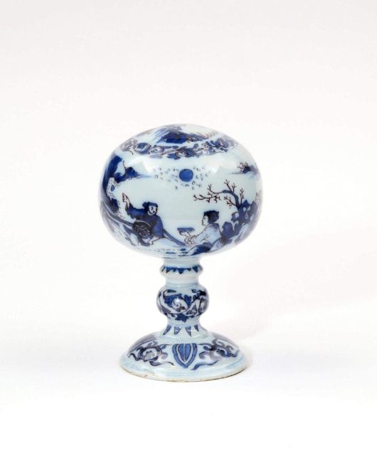 Fig 15: A Delft wig stand produced by the Greek A factory in 1685 - [Aronson](https://www.aronson.com/object/d2002-blue-and-manganese-wig-stand/) 