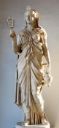 Figure 3: The goddess Isis in Graeco-Roman dress holding a sistrum from the Capitoline museum. [Wikimedia]( https://en.wikipedia.org/wiki/File:Isis_Musei_Capitolini_MC744.jpg)