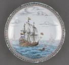 Saucer, dish. Painted in Europe with Dutch ship bearing coat of arms of Zealand. Made of ceramic, porcelain - The Trustees of the British Museum - 357333001.jpg