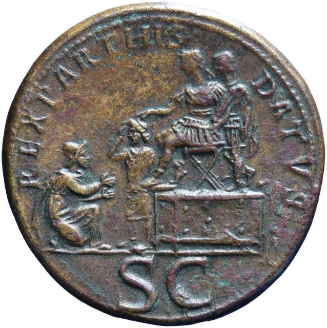 Fig 2: Bronze coin (sestertius) showing Parthia kneeling and Parthamaspates being crowned by emperor Trajan [De Nederlandsche Bank; RIC II 667](https://nnc.dnb.nl/dnb-nnc-ontsluiting-frontend/#/collectie/object/SC-02353)